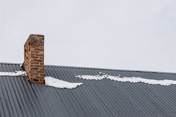 Can Snow and Ice Damage Metal Roofs? Winter Durability Explained