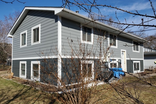 What Causes Moisture to Get Trapped Behind Siding, and How Can It Be Prevented?
