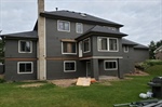 How Often Should Exterior Components Like Flashing, Caulking, and Trim Be Inspected or Replaced?